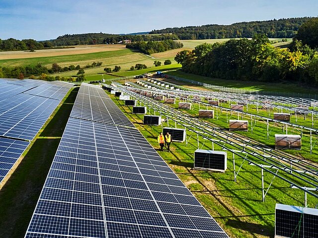 Construction site of the Seckach solar park in sunshine.